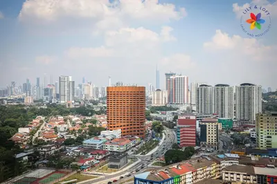 a cityscape of a city with tall buildings at The Pano @ Jalan Ipoh by Lily and Loft in Kuala Lumpur