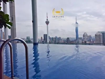 a swimming pool with a view of the city at The Colony Skyline Suites KLCC in Kuala Lumpur
