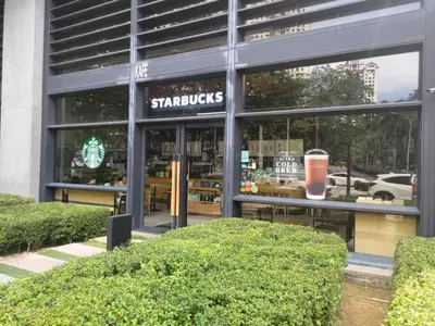 a starbucks building with a sign in the window at TheOoak suite 4pax cozy home stay @mont kiara in Kuala Lumpur