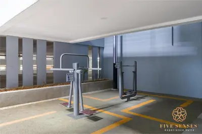 a fitness room with a treadmill in a building at Neu Suites Residence Kuala Lumpur, Roam in Kuala Lumpur