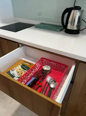 a drawer in a kitchen with utensils in it at Relax Bedroom Studio, The Luxe in Kuala Lumpur