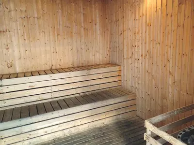 a wooden sauna with a wooden bench in it at 5 Bukit Bintang 5 minutes to Alor Street Bukit Ceylon KLCC Pavilion Apt 3R2B 10 pax in Kuala Lumpur