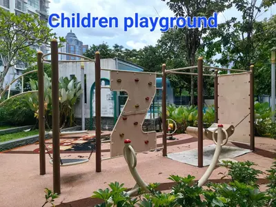a playground in a park with a rock wall at 5 Bukit Bintang 5 minutes to Alor Street Bukit Ceylon KLCC Pavilion Apt 3R2B 10 pax in Kuala Lumpur