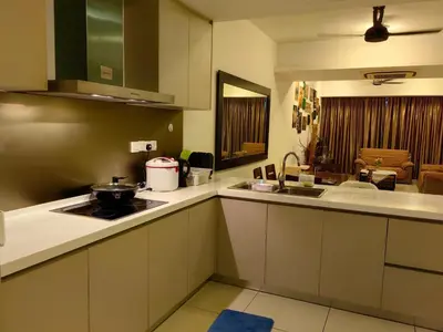 a kitchen with a sink and a stove top oven at 5 Bukit Bintang 5 minutes to Alor Street Bukit Ceylon KLCC Pavilion Apt 3R2B 10 pax in Kuala Lumpur