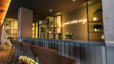 a row of chairs sitting in front of a restaurant at Ceylonz Suite, Bukit Bintang by MK HOME in Kuala Lumpur