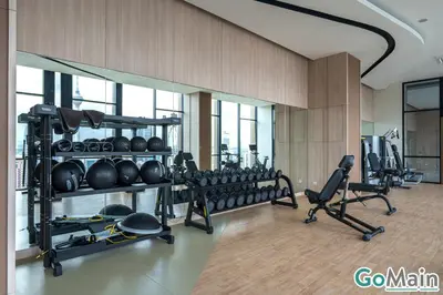 a gym with a bunch of equipment in a room at Axon Bukit Bintang Pavillion KL KLCC by GoMain in Kuala Lumpur