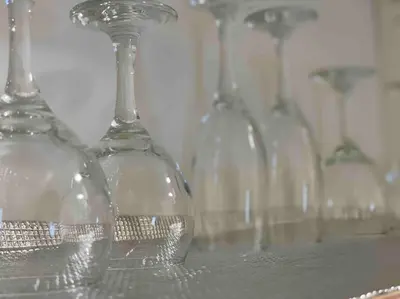 a row of wine glasses sitting on a table at 3BR 8PAX KL City Centre KLCC View Ampang Boulevard Condo in Ampang