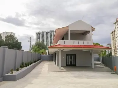 a white house with a fence in front of it at The 29 Bungalow Setapak KL by Manhattan Group in Kuala Lumpur