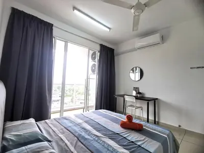 a bedroom with a bed with a red stuffed animal on it at MhPlatinum Gombak ShareHouse Room in Kuala Lumpur