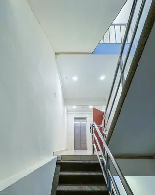 a staircase in a building with a stair case at THE STARION HOTEL BUKIT BINTANG in Kuala Lumpur
