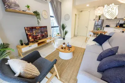a living room with a couch and a tv at Zen-Inspired Duplex Luxury 6Pax, Arte Mont Kiara by Verano in Kuala Lumpur