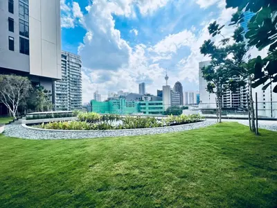 a park with a city in the background at Axon Serviced Suites Kuala Lumpur in Kuala Lumpur