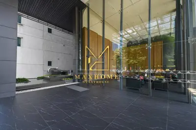 a view of a building with a welcome sign on it at Maxhome Cozy at Dorsett Bukit Bintang in Kuala Lumpur
