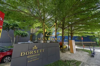 a sign in front of a museum with trees at Maxhome Cozy at Dorsett Bukit Bintang in Kuala Lumpur