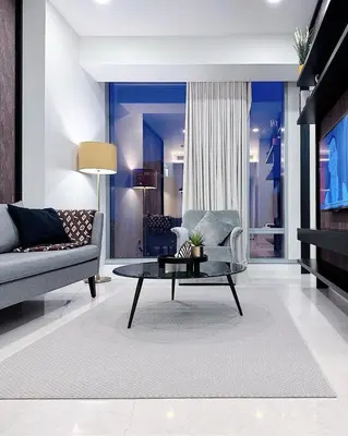a living room with a couch and a coffee table at Luxury Suites at Tropicana Residences KLCC by VV in Kuala Lumpur
