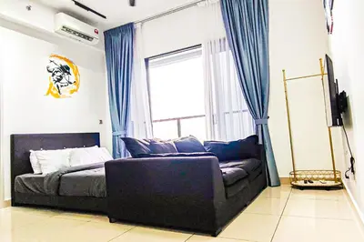 a living room with a couch and a large window at Luxury Balcony at Trion KL by HCK in Kuala Lumpur