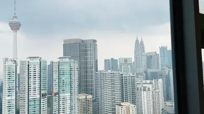 a view of a city skyline with skyscrapers at Panoramic KL View @Robertson Bukit Bintang 40f in Kuala Lumpur