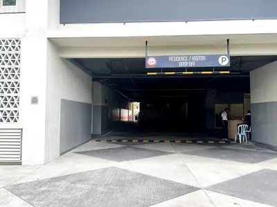 an entrance to a building with a sign on it at Infini Suites@ UNA Residences, Sunway Velocity KL in Kuala Lumpur