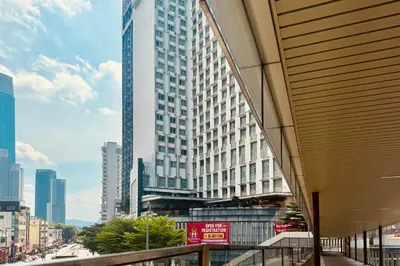 a view of a tall building in a city at Comfy-Concept Apartment @ B.Bintang (3min walk LRT, Lalaport, TimeSquare) in Kuala Lumpur