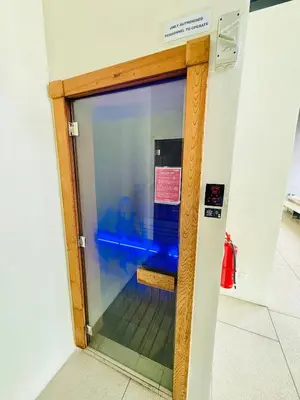 a glass door in a building with a sign on it at BBCC APARTMENT AT LUCENTIA 2 in Kuala Lumpur