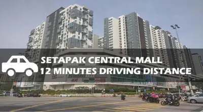 a large building with a sign that reads seafort central mall minutes driving distance at Seeds Hotel Chow Kit in Kuala Lumpur