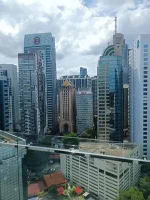 a view of a large city with tall buildings at RM218 Bukit Bintang Balcony Studio Infinity Pool in Kuala Lumpur