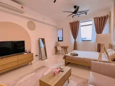 a bedroom with a bed and a flat screen tv at Cozy & Homely Chambers KL@3 Mins Walking Distance to LRT & Monorail in Kuala Lumpur