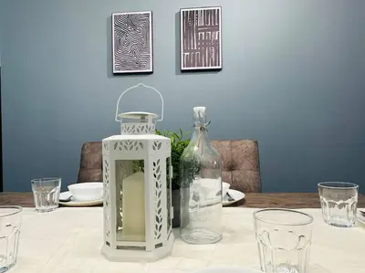 a table with glasses and a vase on it at MVD15#Family Suite 8pax 3 Rooms Sunway Velocity Mall Cheras IKEA Mytown Short Walk to MRT & LRT Maluri in Kuala Lumpur