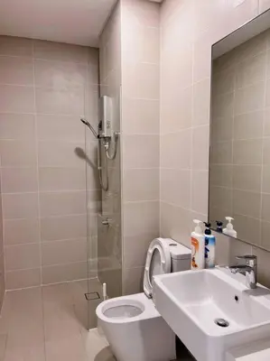 a bathroom with a shower and a toilet and a sink at Ample 2BR 4px Seputeh @ Near MidValley & Garden Mall, Old Klang Road in Kuala Lumpur