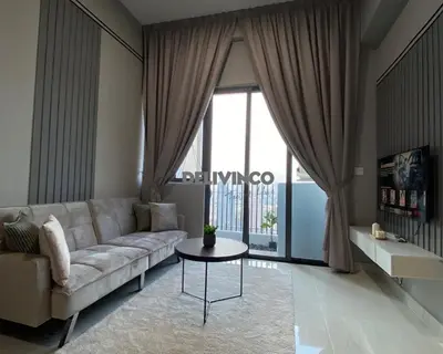 a living room with a couch and a table at The Luxe - 3 pax - KLCC View - Balcony at 27 floor in Kuala Lumpur