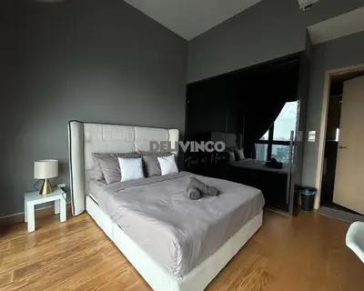 a bedroom with a large bed and a large window at The Luxe - KLCC View - 3 pax Balcony at 41 floor in Kuala Lumpur
