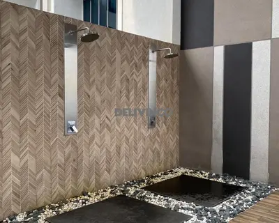 a bathroom with a shower with a mosaic floor at The Luxe - KLCC View - 3 pax Balcony at 41 floor in Kuala Lumpur