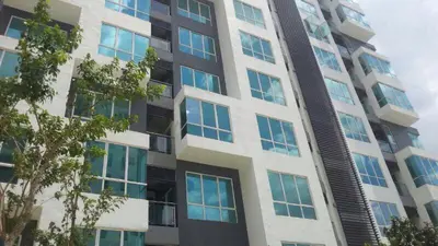 a tall building with many windows on it at Setapak Central Mall KL - Zetapark Garden Suites in Kuala Lumpur
