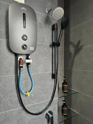a shower with a blow dryer in a bathroom at Neu Suites @ 3rdNvenue 003 in Kuala Lumpur