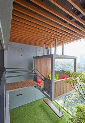 a house with a balcony with a view of the city at Luxurious Ceylonz Suite near Bukit Bintang 4pax in Kuala Lumpur