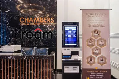 a ticket booth for a chanel honky tonk room with a trophy at Chambers Residence, Sunway Putra Mall in Kuala Lumpur