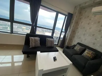 a living room with a couch and a table at Arte plus by sweet home 2BR in Kuala Lumpur
