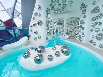 a pool of water with a bunch of silver balls at Arte plus by sweet home 2BR in Kuala Lumpur