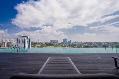 a view of a large body of water with a city at Societe Suites By iHost Global in Kuala Lumpur