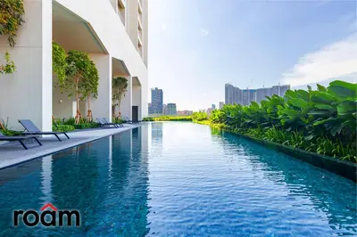 a swimming pool in the middle of a building at UNA Residences, Sunway KL in Kuala Lumpur