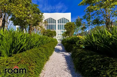 a building with a gravel path in front of a building at UNA Residences, Sunway KL in Kuala Lumpur