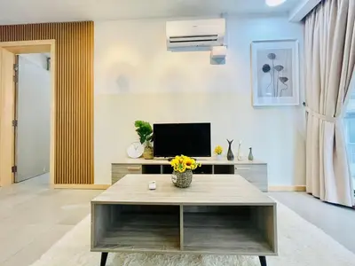 a living room with a table and a tv at #125 Bintang Fairlane KLCC - Lot 10 - Pavilion - Fahrenheit for 1-5px in Kuala Lumpur