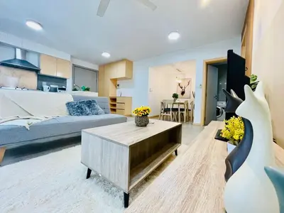 a living room with a bed and a table in a room at #125 Bintang Fairlane KLCC - Lot 10 - Pavilion - Fahrenheit for 1-5px in Kuala Lumpur