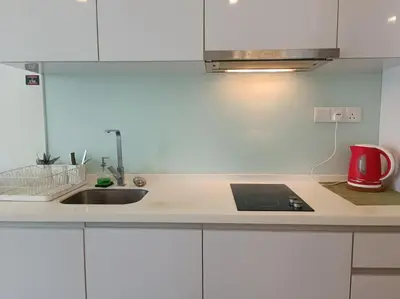 a kitchen with a sink and a counter top at RM238 Bukit Bintang Balcony Studio Infinty Pool in Kuala Lumpur