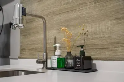 a bathroom counter with a sink and a bottle of soap at The Play Suite@Pano. MRT. Free Parking. Self C/In in Kuala Lumpur