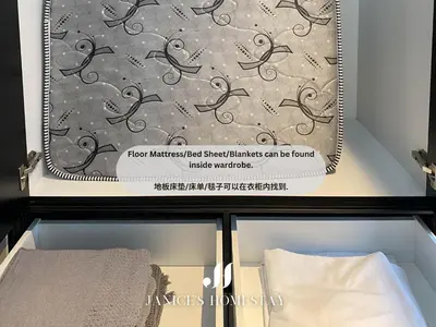 a box with a sign that says how miraged bad sheet blankets can be found at Axon Residences Bukit Bintang by Janice's Homestay in Kuala Lumpur