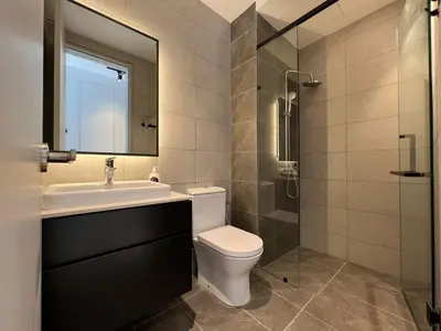 a bathroom with a toilet and a sink and a shower at Axon Residence Bukit Bintang Kuala Lumpur By Apex in Kuala Lumpur