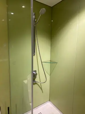 a shower with a glass door in a bathroom at sky suite klcc in Kuala Lumpur