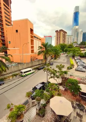 a view of a city street with a bus at Bestow Boutique Hotel in Kuala Lumpur