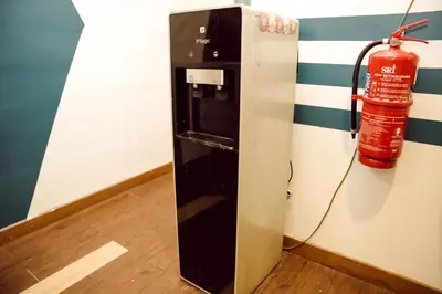 a fire extinguisher is attached to a wall at V Hotel Titiwangsa in Kuala Lumpur